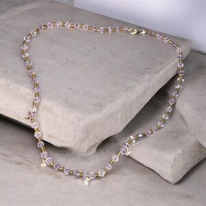 Elegant Gold and Purple Beaded Necklace